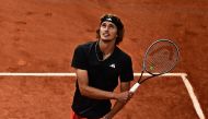 Germany's Alexander Zverev reacts as he celebrates his victory over Argentina's Tomas Martin Etcheverry during their men's singles quarter final match on day eleven of the Roland-Garros Open tennis tournament at the Court Philippe-Chatrier in Paris on June 7, 2023. (Photo by JULIEN DE ROSA / AFP)