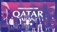 Winners with officials and Qatar Airways cabin crew.