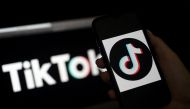 In this file photo taken on April 13, 2020 the social media application logo, TikTok is displayed on the screen of an iPhone in Arlington, Virginia. Photo by Olivier DOULIERY / AFP