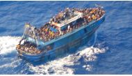 File photo: This image released by The Hellenic Coastguard on June 14, 2023, shows an aerial view taken from a rescue helicopter, of migrants onboard a fishing vessel in the waters off the Peloponnese coast of Greece on June 13, 2023. (Photo by HELLENIC COASTGUARD / AFP)

