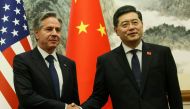 US Secretary of State Antony Blinken (L) and China's Foreign Minister Qin Gang shake hands ahead of a meeting at the Diaoyutai State Guesthouse in Beijing on June 18, 2023. (Photo by LEAH MILLIS / POOL / AFP)