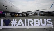 This photograph taken on June 19, 2023 shows an Airbus sign during the International Paris Air Show at the Paris Bourget Airport. (Photo by Emmanuel Dunand / AFP)
