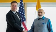 This handout photograph taken on June 20, 2023 and released by the Indian Press Information Bureau (PIB) shows India's Prime Minister Narendra (R) shaking hands with SpaceX, Twitter and electric car maker Tesla CEO Elon Musk during their meeting in New York. Photo by PIB / AFP