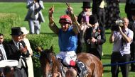 Jockey Frankie Dettori guides Gregory to win the Queen Vase Group 2 race.