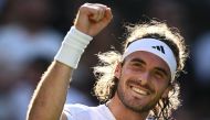 Greece's Stefanos Tsitsipas celebrates after winning against Britain's Andy Murray during their men's singles tennis match on the fifth day of the 2023 Wimbledon Championships at The All England Tennis Club in Wimbledon, southwest London, on July 7, 2023. (Photo by SEBASTIEN BOZON / AFP) 