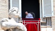 Pope Francis leaves after he addressed the crowd from the window of the apostolic palace overlooking St.Peter's square during his Angelus prayer at the Vatican on July 9, 2023. (Photo by Alberto PIZZOLI / AFP)
