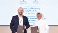 UDST President Dr. Salem Al Naemi (right), and CEO and Managing Director of RKH Qitarat Kevin Thomas at the signing event. 