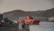 A Spanish Maritime Rescue vessel arrive after rescuing migrants at sea, in the Port of Arguineguin on the Canary Island of Gran Canaria, on July 10, 2023. (Photo by DESIREE MARTIN / AFP)
