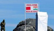 An Indian soldier keep watch at Bumla Pass on the India-China border in Arunachal Pradesh. (File photo / AFP)