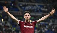 West Ham United's English midfielder Declan Rice greets supporters as he leaves the pitch during the UEFA Europa League quarter-final second-leg football match between Olympique Lyonnais (OL) and West Ham United at the Groupama stadium in Decines-Charpieu near Lyon, central eastern France, on April 14, 2022. (Photo by Jeff PACHOUD / AFP)

