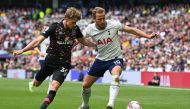 Brentford's Danish defender Mads Roerslev (L) vies with Tottenham Hotspur's English striker Harry Kane during the English Premier League football match between Tottenham Hotspur and Brentford at Tottenham Hotspur Stadium in London, on May 20, 2023. (Photo by Glyn KIRK / AFP)

