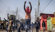 Opposition supporters gather and chant slogans during clashes with Kenya Police Officers on the third day of anti-government protests in Nairobi, Kenya on July 21, 2023. (Photo by Luis Tato / AFP)
