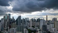 This photo taken on July 2, 2023 shows high rise commercial and residential buildings in downtown Bangkok. (Photo by Amaury PAUL / AFP)