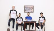 Al Sadd players sporting their new home kit.