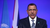 (FILES) Niger's President Mohamed Bazoum presents his national statement as part of the World Leaders' Summit of the COP26 UN Climate Change Conference in Glasgow, Scotland on November 1, 2021. (Photo by YVES HERMAN / POOL / AFP)