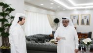 Assistant Undersecretary for Real Estate Registration and Authentication Affairs and Chairperson of the Real Estate Brokers’ Affairs Committee Saeed Abdullah Al Suwaidi (left) with one of the licensees during the event.