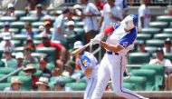 Matt Olson #28 of the Atlanta Braves hits a three-run homer in the third inning against the Milwaukee Brewers at Truist Park on July 30, 2023 in Atlanta, Georgia. Kevin C. (Photo by Kevin C. Cox / GETTY IMAGES NORTH AMERICA / Getty Images via AFP)