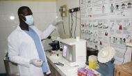 A medical staff working in the laboratory at Hamad bin Khalifa Hospital in Boutilimit, Mauritania.