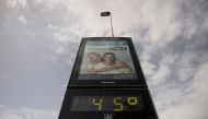 A street thermometer reads 45 degrees Celsius during a heatwave in Cordoba, southern Spain on August 8, 2023. (Photo by Jorge Guerrero / AFP)
 