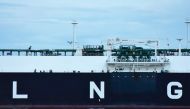 A liquefied natural gas (LNG) tanker as seen from shore.