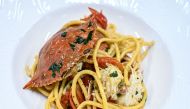 Picture of a dish of pasta with blue crab meat harvested in the Scardovari lagoon, taken at Chef Luca Faraon's holiday farm restaurant in Eraclea, near Venice, Italy on August 11, 2023. (Photo by Piero Cruciatti / AFP)