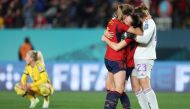 Spain players celebrate their victory after the end of the Australia and New Zealand 2023 Women's World Cup semi-final football match between Spain and Sweden at Eden Park in Auckland on August 15, 2023. (Photo by Michael Bradley / AFP)