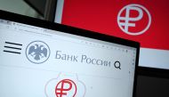 This photograph taken on August 15, 2023, shows the logo of a new Russian digital ruble displaying on the laptop screen in Moscow. (Photo by Sergei Gapon / AFP)

