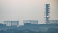 A general view shows a section of the Tokyo Electric Power Company Holdings (TEPCO) Fukushima Daiichi nuclear power plant from a hilltop in Tomioka town about 12km away from the facility in Fukushima Prefecture, on August 20, 2023. Photo by Philip FONG / AFP