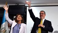 Guatemalan presidential candidate for the Movimiento Semilla party, Bernardo Arevalo, and his Vice President Karin Herrera celebrate the results of the presidential run-off election in Guatemala City, on August 20, 2023. (Photo by Luis Acosta / AFP)