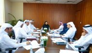 Chairperson of the National Human Rights Committee H E Maryam bint Abdullah Al Attiyah with other officials discussing preparation for the second national forum.