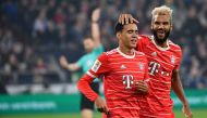 File photo: Bayern Munich's Cameroonian forward Eric Maxim Choupo-Moting (right) reacts with Bayern Munich's German midfielder Jamal Musiala during the German first division Bundesliga football match between Schalke 04 v Bayern Munich in Gelsenkirchen, Germany, on November 12, 2022. (Photo by UWE KRAFT / AFP)

