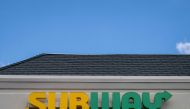 The Subway sign hangs over the sandwich shop in Annapolis, Maryland, on August 23, 2023. The Subway sandwich chain is near a deal to be acquired for more than $9 billion in a transaction that could be announced as soon as August 23, 2023, a person familiar with the matter said. (Photo by Jim WATSON / AFP)
