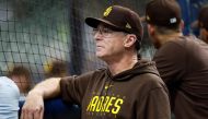 Manager Bob Melvin #3 of the San Diego Padres watches batting practice before the game against the Milwaukee Brewers at American Family Field on August 26, 2023 in Milwaukee, Wisconsin. (Photo by John Fisher / GETTY IMAGES NORTH AMERICA / Getty Images via AFP)