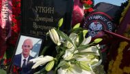 A view shows the grave of Wagner private mercenary group military commander Dmitry Utkin, who was killed in a private jet crash in the Tver region last week, at the Federal Military Memorial Cemetery in the Moscow region on August 31, 2023. (Photo by Natalia KOLESNIKOVA / AFP)

