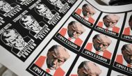 Trump stickers featuring his mug shot are displayed for sale at the Y-Que shop in Los Angeles, California on August 30, 2023. (Photo by Robyn Beck / AFP)

