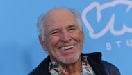 (Files) US musician Jimmy Buffett arrives for the Los Angeles premiere of 