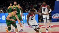 :Lithuania's Rokas Jokubaitis (L) and USA's Anthony Edwards (R) compete for the ball during the FIBA Basketball World Cup second round match between USA and Lithuania at Mall of Asia Arena in Pasay City, suburban Manila on September 3, 2023. (Photo by JAM STA ROSA / AFP)