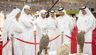 Minister of Environment and Climate Change H E Sheikh Dr. Faleh bin Nasser bin Ahmed bin Ali Al Thani (second left) accompanied by Katara General Manager, Prof. Dr. Khalid bin Ibrahim Al Sulait (third left) and other officials visiting Katara International Hunting and Falcons Exhibition S’hail. 