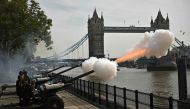A 62 Gun Royal salute is fired from Tower Wharf, beside The Tower of London by the Honourable Artillery Company, British Army, taking place to mark the first anniversary of His Majesty The King's accession to the throne, in London on September 8, 2023. (Photo by Daniel Leal / AFP)