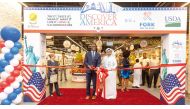 US Ambassador to Qatar H E Timmy Davis and CEO of Al Meera Yousef Ali Al Obaidan inaugurating ‘Discover America with a Fork and the Road’ campaign at an Al Meera Branch.