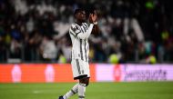 A picture taken on May 11, 2023 in Turin shows Juventus' French midfielder Paul Pogba acknowledging the public at the end of the UEFA Europa League semi-final first leg football match between Juventus and Sevilla.  (Photo by Marco Bertorello / AFP)
