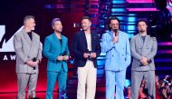(L-R) Joey Fatone, Lance Bass, Justin Timberlake, JC Chasez, and Chris Kirkpatrick of *NSYNC speak onstage the 2023 MTV Video Music Awards at Prudential Center on September 12, 2023 in Newark, New Jersey. Theo Wargo/Getty Images for MTV/AFP 