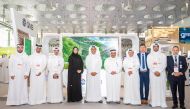 Officials pose for a group photo at the QNB pavilion.