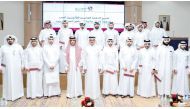 Minister of Justice H E Masoud bin Mohammed Al Ameri with the graduates  during the ceremony.