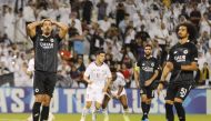 Al Sadd's Baghdad Bounedjah (left) reacts after missing a penalty during Monday's match.