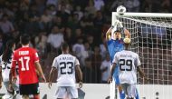 Al Duhail goalkeeper Salah Zakaria makes a save.