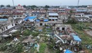 This aerial view shows damaged buildings after a tornado hit the city of Suqian, in China's eastern Jiangsu province on September 20, 2023. (Photo by AFP) / China OUT
