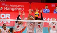 Action during volleyball game between Qatar and Hong Kong. 