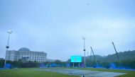 A general view shows covers on he field as rain delays the start of the 2022 Asian Games women's quarter-final cricket match between Bangladesh and Hong Kong in Hangzhou in China's eastern Zhejiang province on September 22, 2023. (Photo by Ishara S. KODIKARA / AFP)
