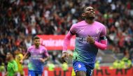 AC Milan's Portuguese forward #10 Rafael Leao celebrates after scoring during the Italian Serie A football match between AC Milan and Hellas Verona at San Siro stadium in Milan, on September 23, 2023. (Photo by Piero CRUCIATTI / AFP)
